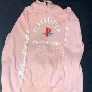 i’m selling a pink playstation hoodie that’s a size medium